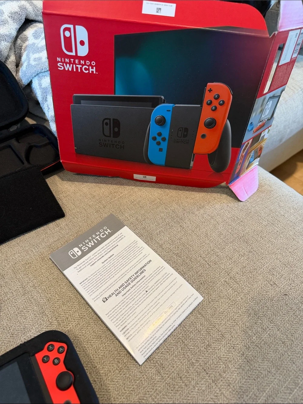 LIKE NEW Nintendo Switch with Neon Blue & Neon Red Joy‑Con and Accessories